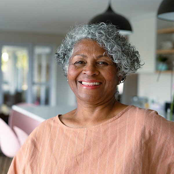 Happy older woman smiling at camera